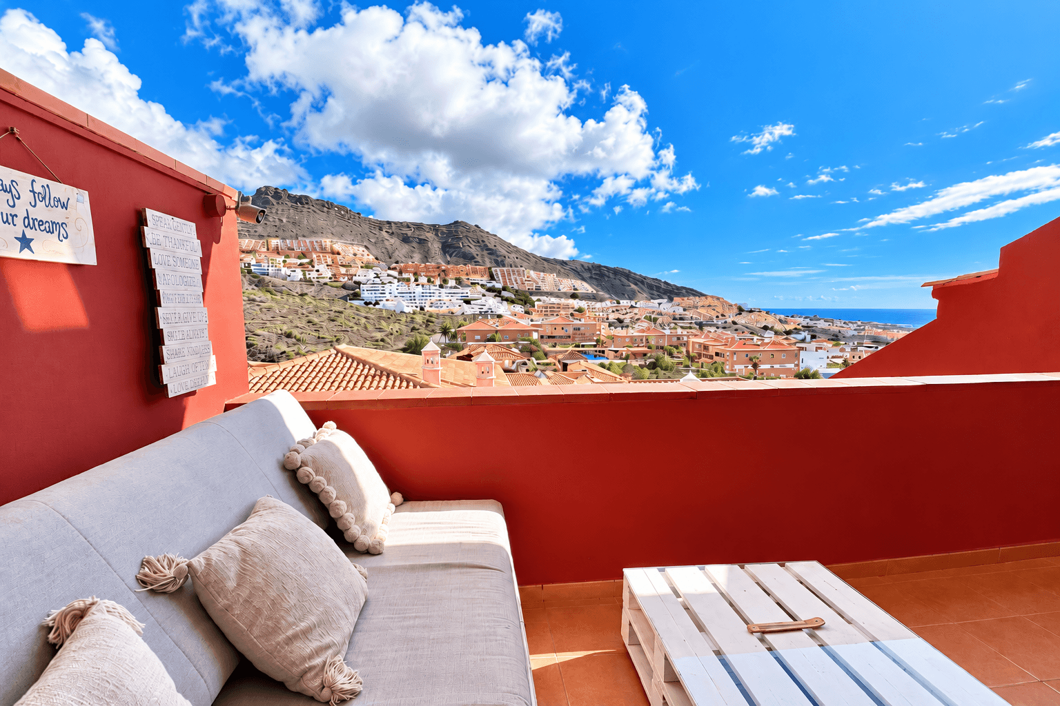 Sunny balcony terrace with mountain and partial sea views in Costa Adeje, Tenerife