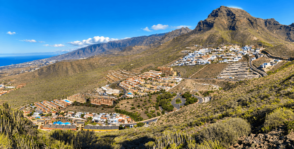 Roque del Conde hillside in Costa Adeje with residential areas and mountain views