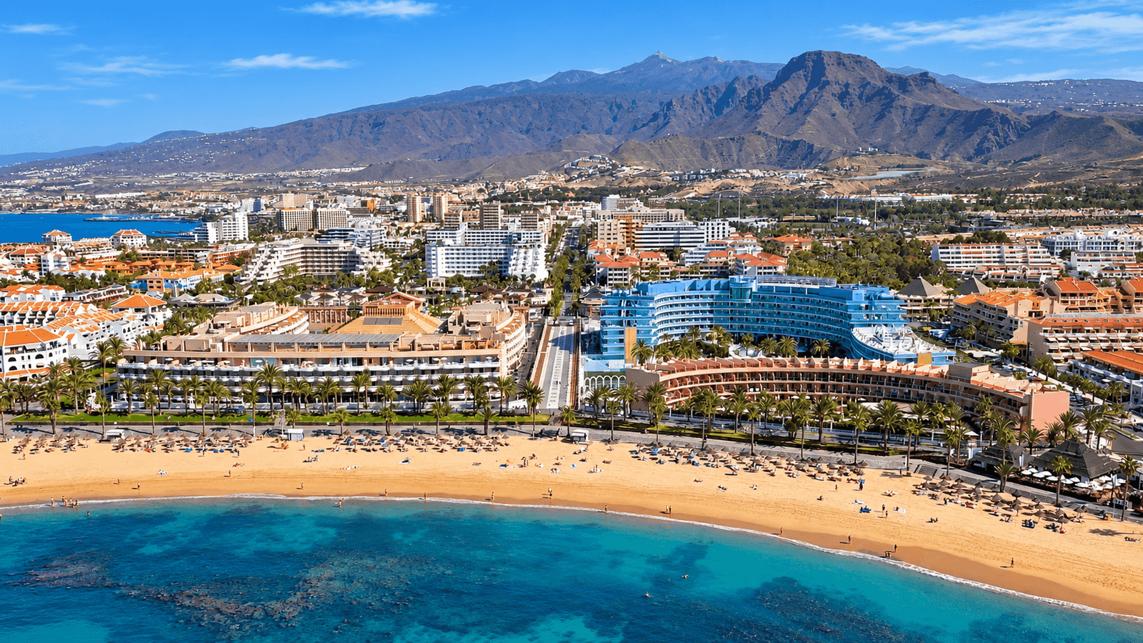 Aerial view of beachfront apartments and hotels in Playa de Las Américas, Tenerife